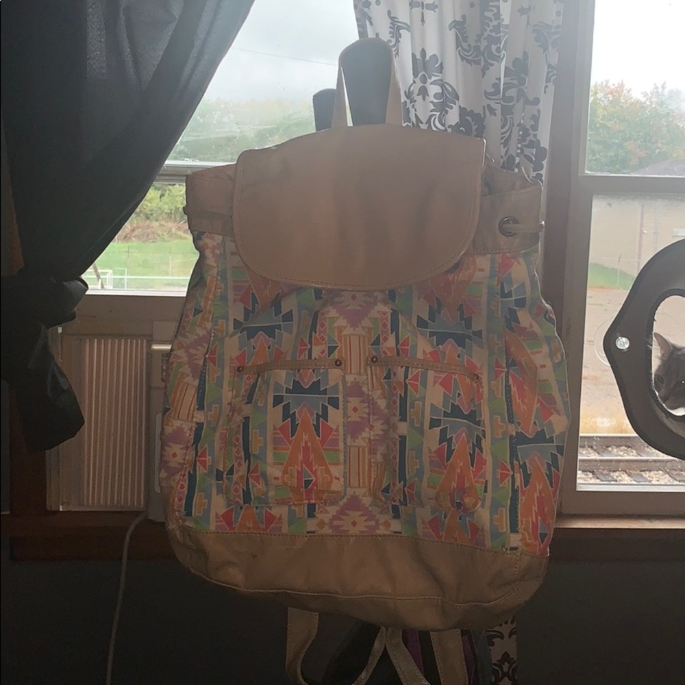 Faux leather accent backpack